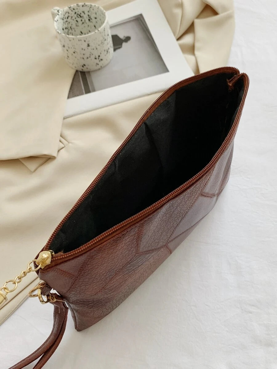 Irene – Retro Chic Embossed Wristlet Bag